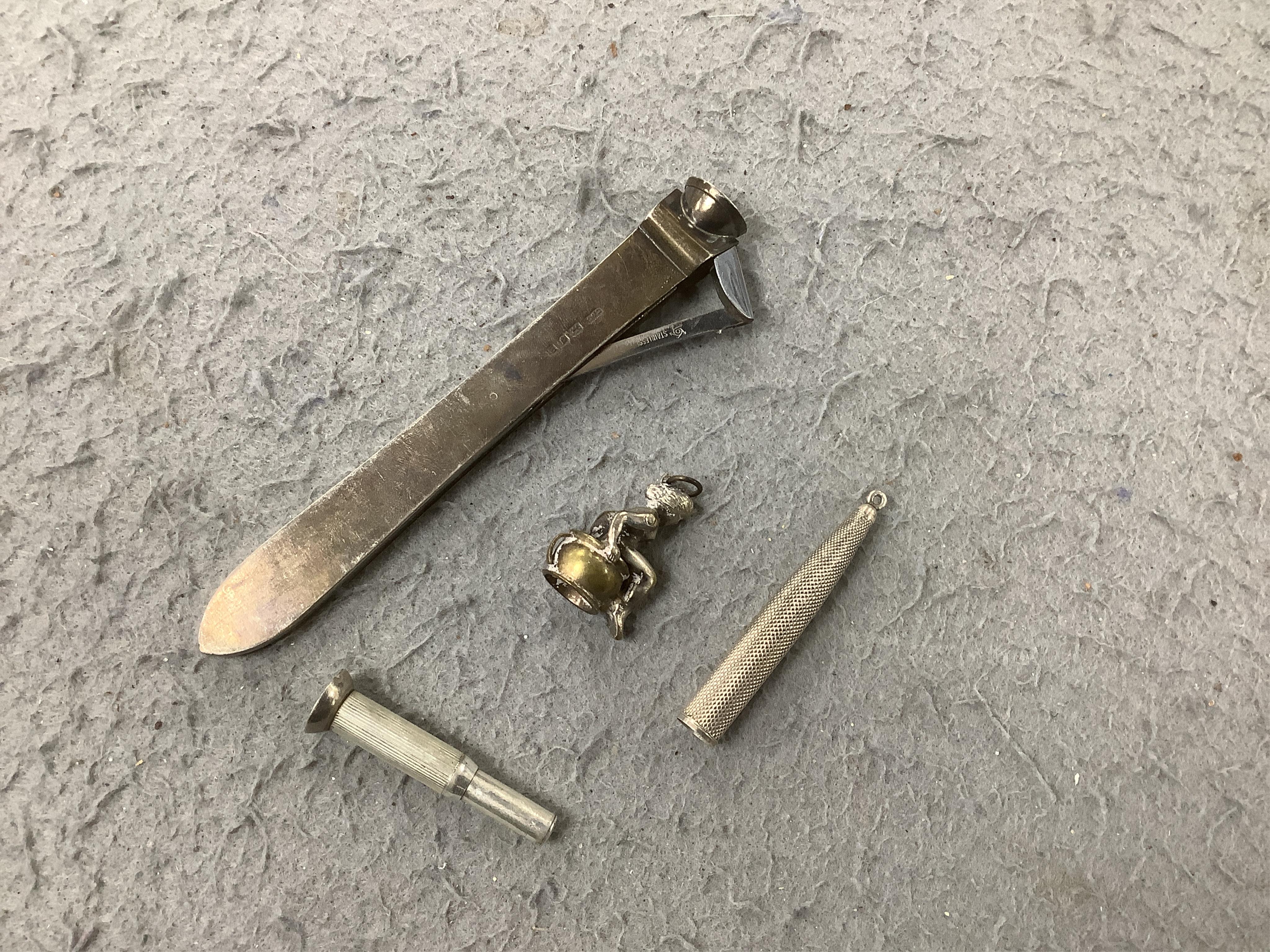 A collection of cigar cutters etc. Condition - fair